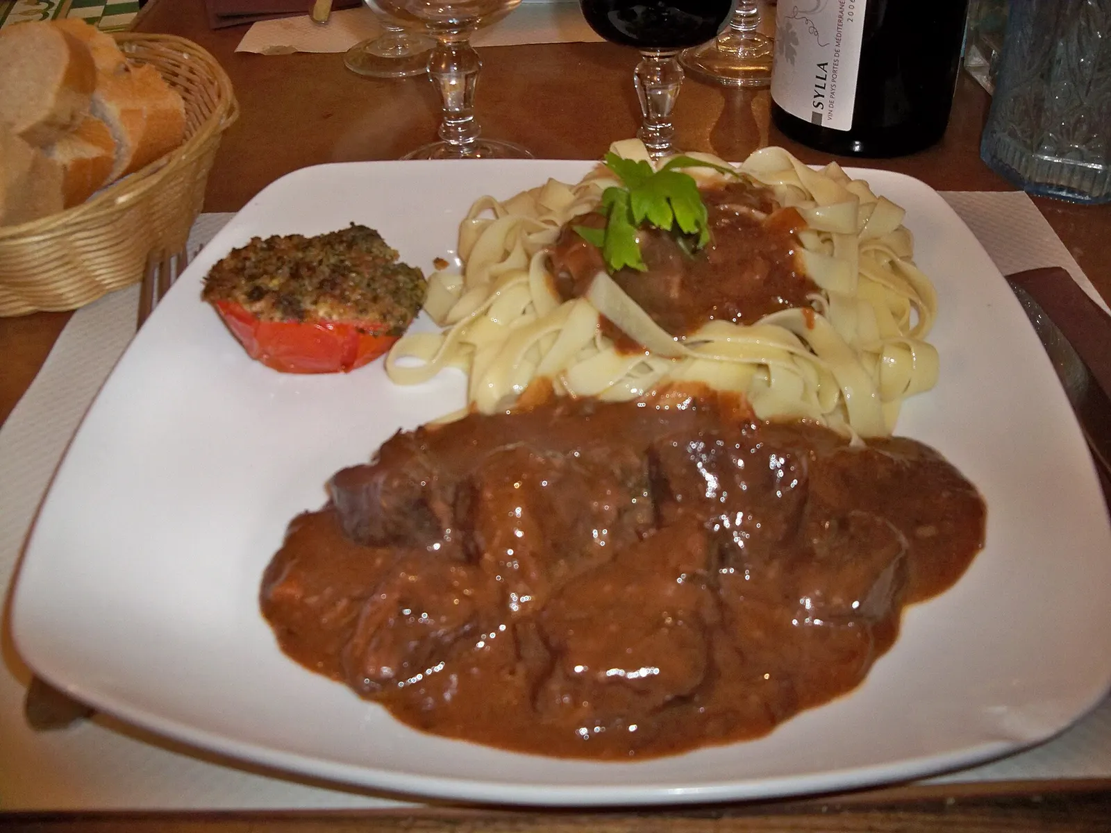 A bowl of beef bourguignon, the beef slow-braised in red wine with mushrooms and lardons